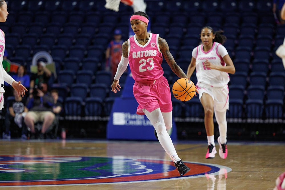 Florida guard Liv McGill (23) dribbles down the court during the second half of an NCAA basketball game against Arkansas, Sunday, Feb. 8, 2026, in Gainesville, FL.