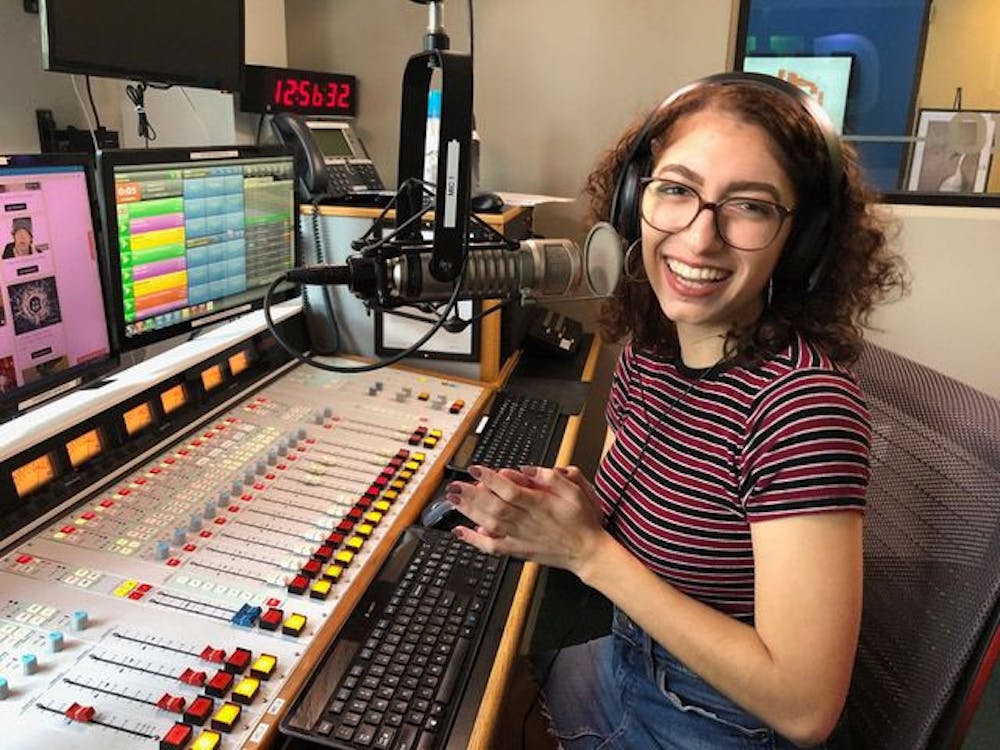 <p>Cady Casellas, a 20-year-old UF telecommunication junior, hosts her new radio show, “Chisme Con Cady” from Weimer Hall.</p>