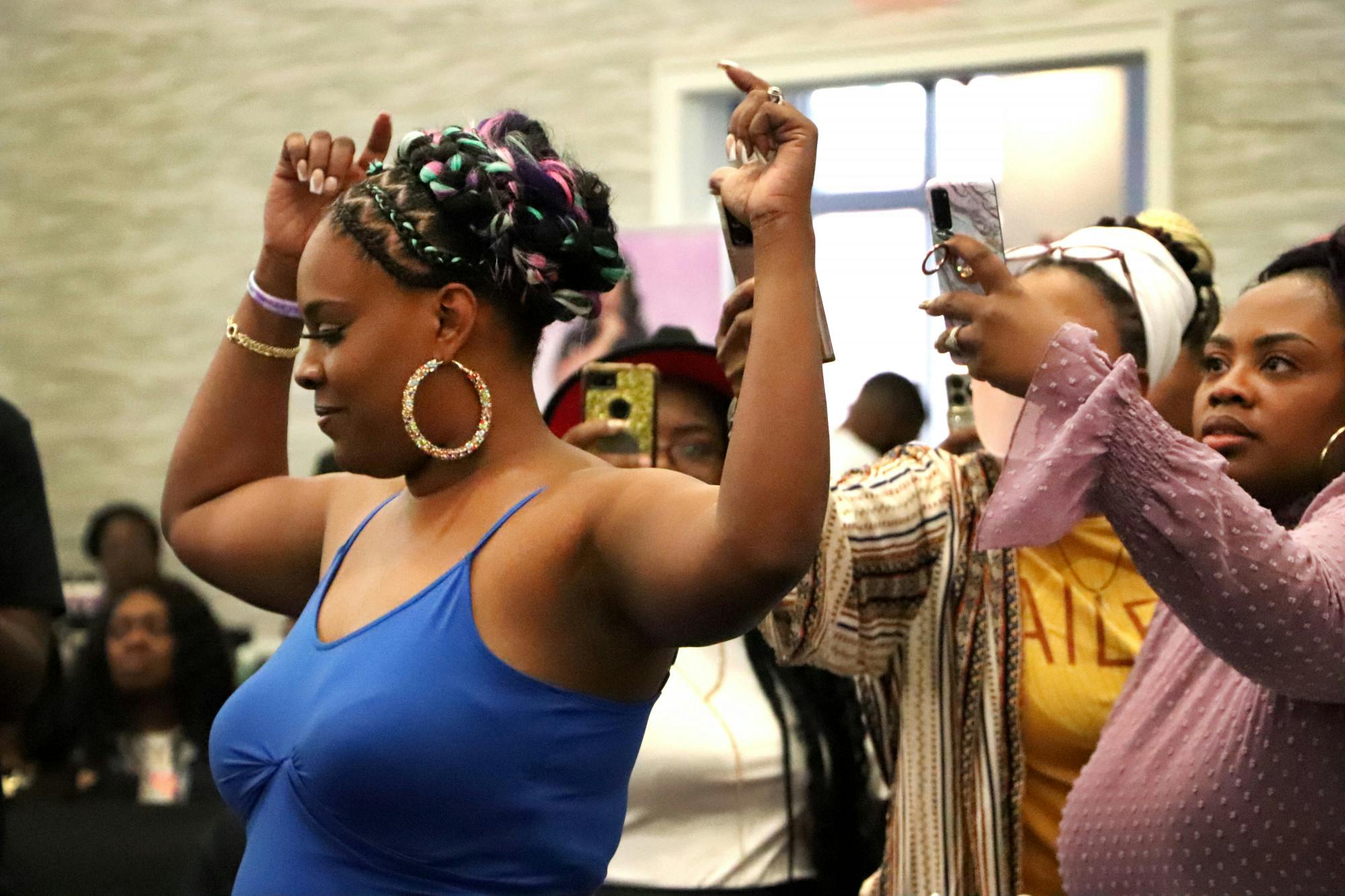 Model Asteria Kennedy shows off her hair to the judges at the Ultimate Braiding Battle at the Hilton hotel on Southwest 34th Street on Saturday, March 19. Kennedy's stylist Rashawnda Thomas won the $1,000 prize. 