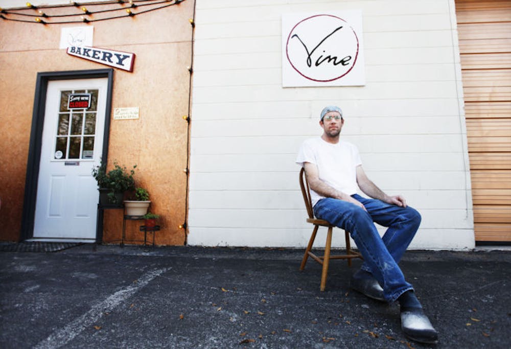 <p>Dean Griebel, 46, sits outside Vine Bread &amp; Pasta on NE 23rd Ave., which he co-owns with his girlfriend, Teresa Zokovitch.</p>