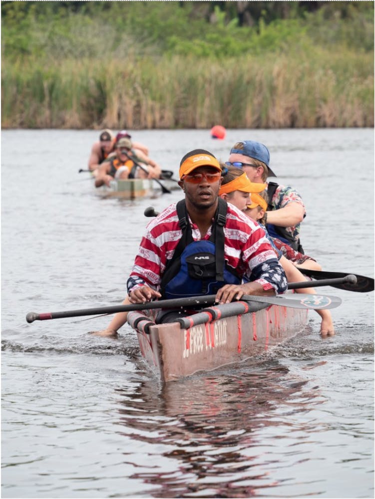 Niam Villabrera, Susanna van de Graad, Sedona Iodice and Nathan O’Donnell (front to back) canoeing in the coed sprint race.