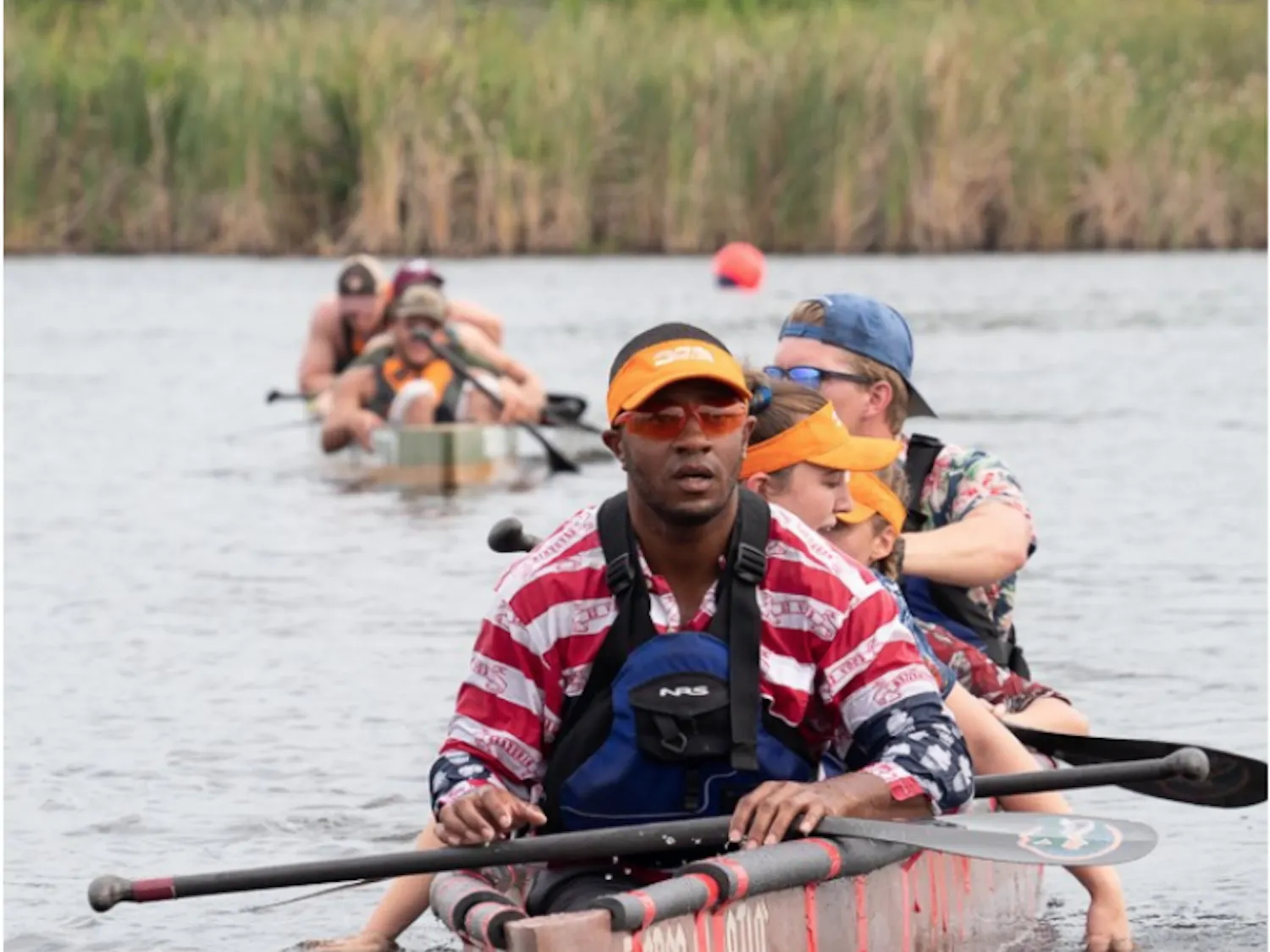 Niam Villabrera, Susanna van de Graad, Sedona Iodice and Nathan O’Donnell (front to back) canoeing in the coed sprint race.