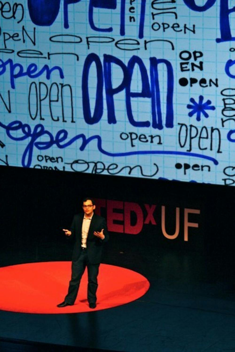 <p>Michael Jones speaks about content sharing at TEDxUF in the Curtis M. Phillips Center for the Performing Arts on Saturday. Jones is working to develop the world's largest database of open educational material.</p>