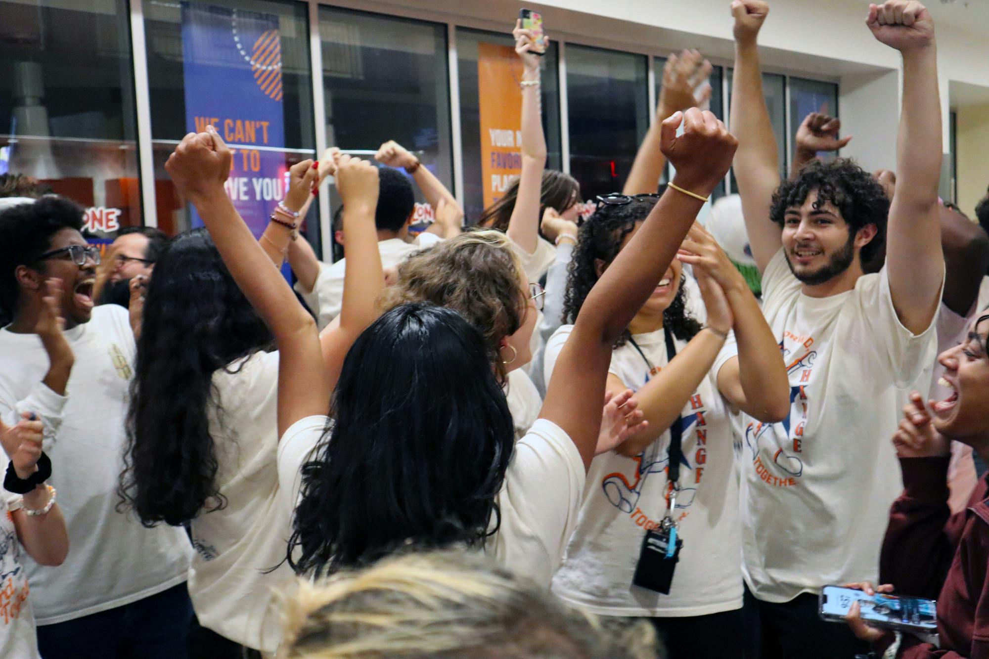 Members of Change Party celebrate several district wins in the Senate at the Reitz Union, Monday, Oct. 3, 2022. Change Party won 27 seats and Gator Party won 22. 