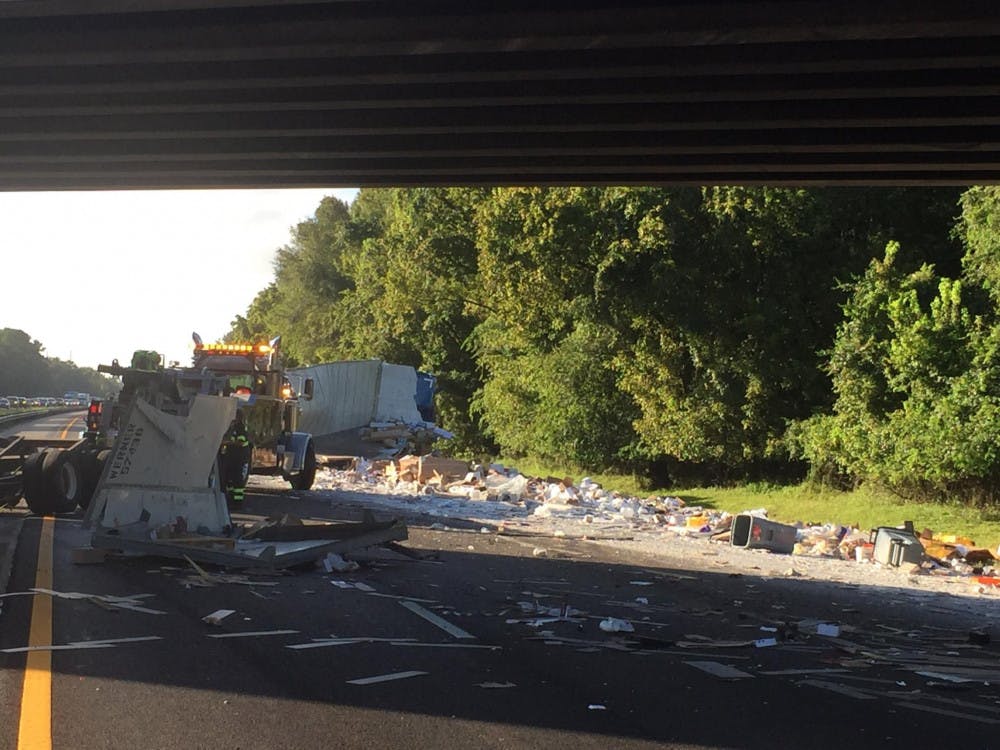 <p>Construction materials spilled over all three Southbound lanes on Interstate 75 after a semi tipped over Friday morning.</p>