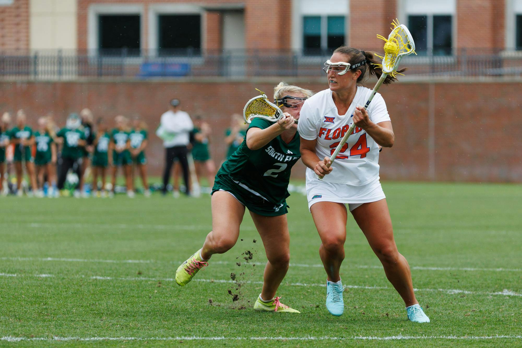 Florida midfielder Gabbi Koury (24) looks to pass towards the goal during an NCAA Lacrosse game against South Florida, Wednesday, April 8, 2026, in Gainesville, Fla.