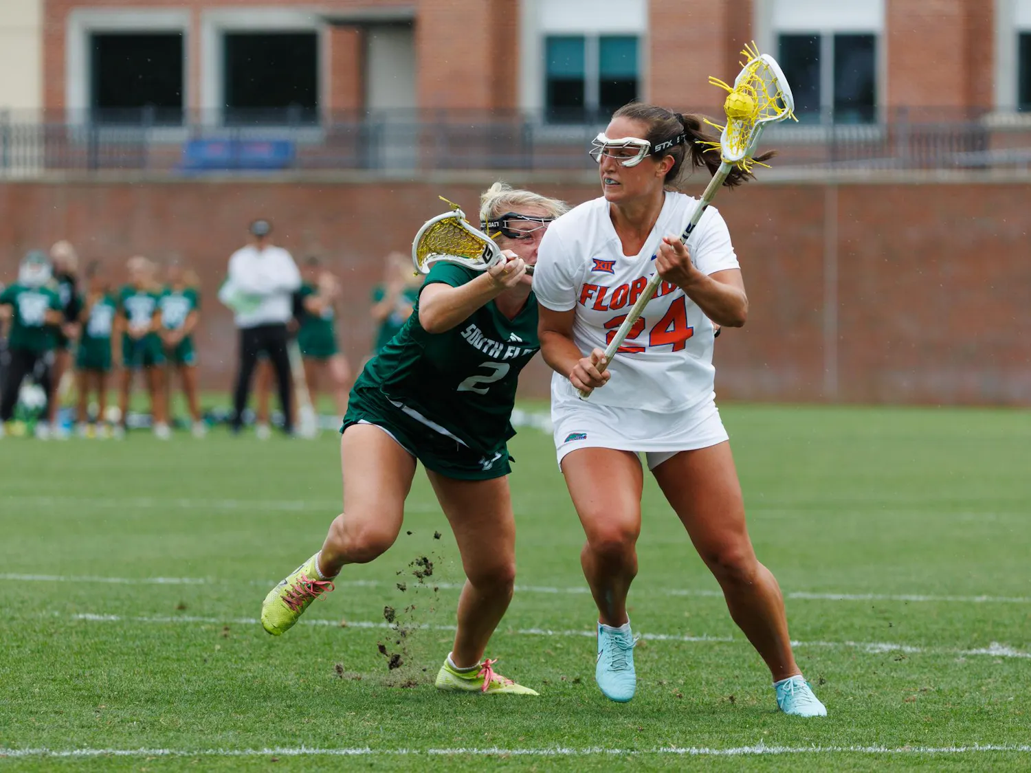Florida midfielder Gabbi Koury (24) looks to pass towards the goal during an NCAA Lacrosse game against South Florida, Wednesday, April 8, 2026, in Gainesville, Fla.