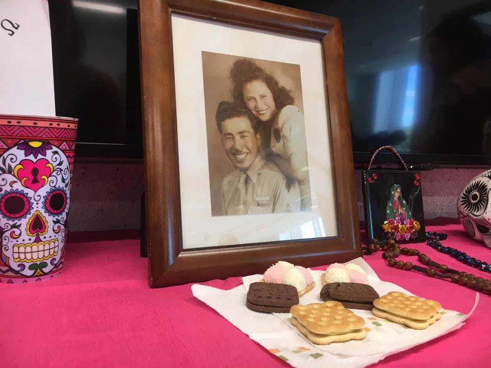 Jose Audon Marquez, who died in April 2016, smiles with his wife. Meriza Candia, vice president of the Mexican American Student Association, put out the photo for the Day of the Dead, a religious holiday.