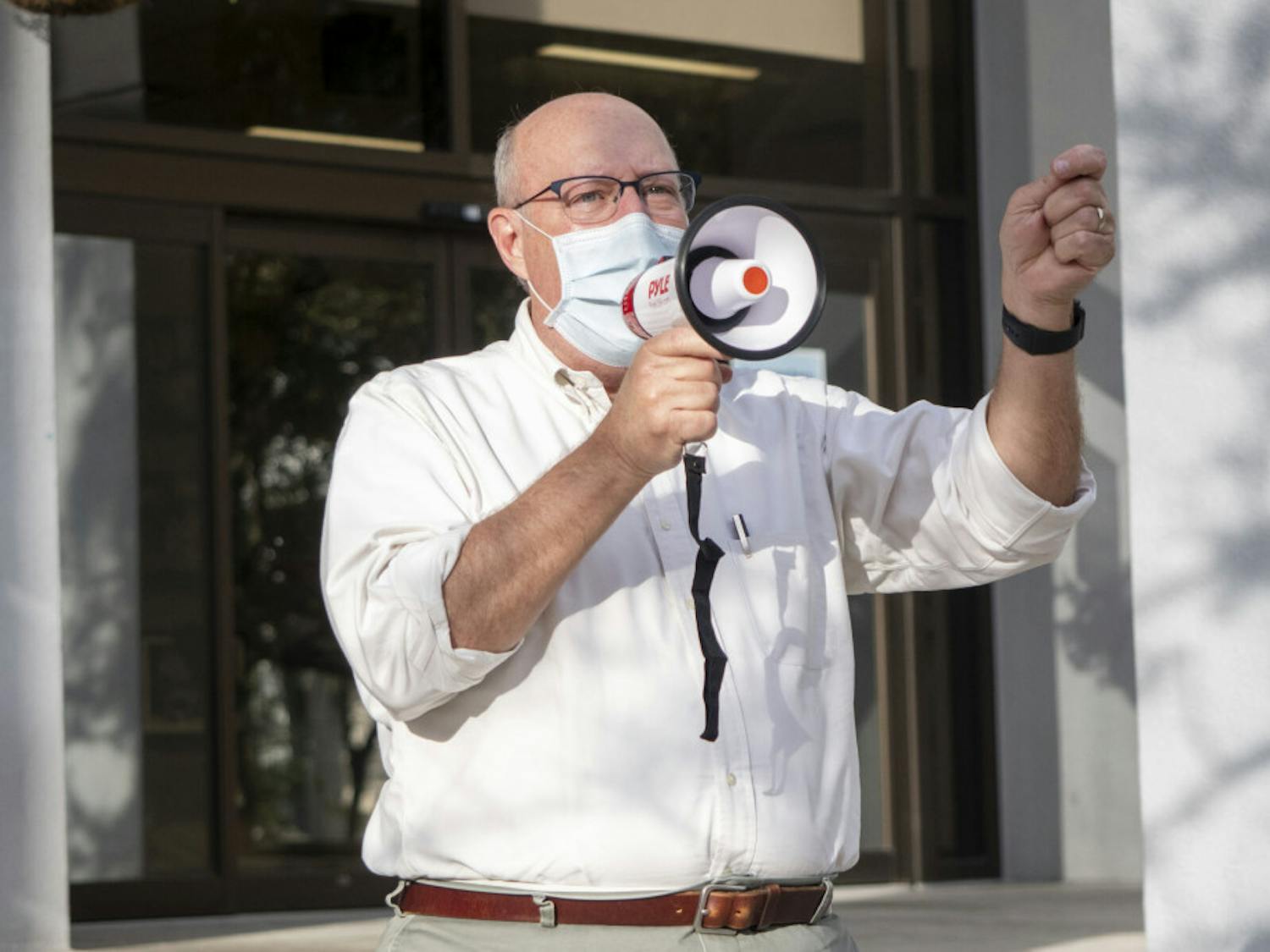 Gainesville Commissioner for district 2, Harvey Ward, is seen giving a short speech during the "Protect the Results" rally held at the Alachua City Hall on Wednesday, Nov. 4, 2020. (Emily Felts/Alligator Staff)
