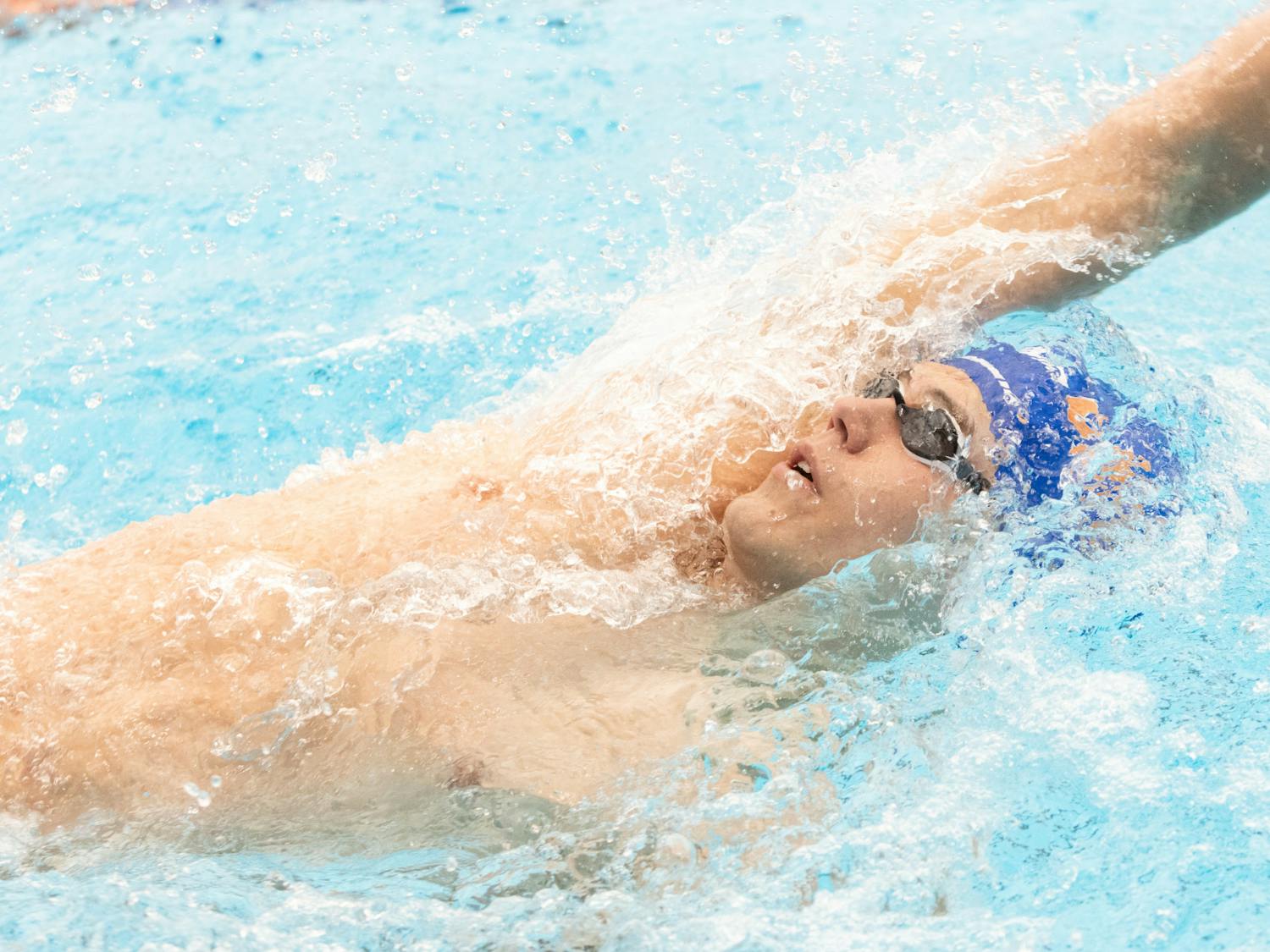 Freshman Amadeusz Knop completes a backstroke in the Florida Invitational against Nova Southeastern, Friday, Feb. 2, 2024.