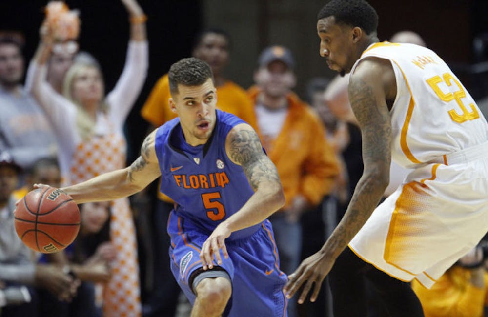 <p>Scottie Wilbekin (5) drives against Tennessee guard Jordan McRae (52) in the first half of Florida’s 67-58 win on Feb. 11 in Knoxville, Tenn. Wilbekin was named the Southeastern Conference Player of the Week on Monday.</p>