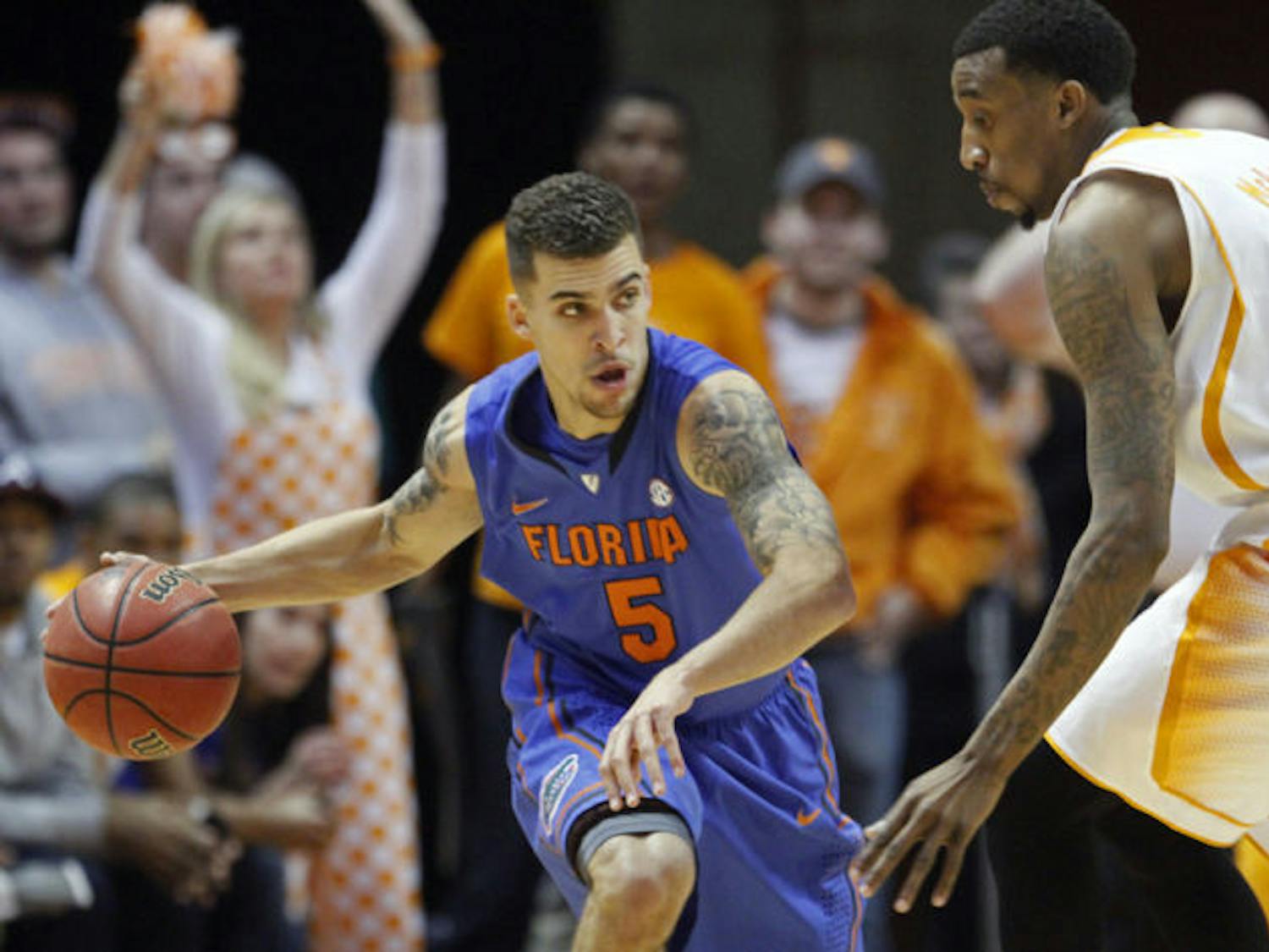 Scottie Wilbekin (5) drives against Tennessee guard Jordan McRae (52) in the first half of Florida’s 67-58 win on Feb. 11 in Knoxville, Tenn. Wilbekin was named the Southeastern Conference Player of the Week on Monday.