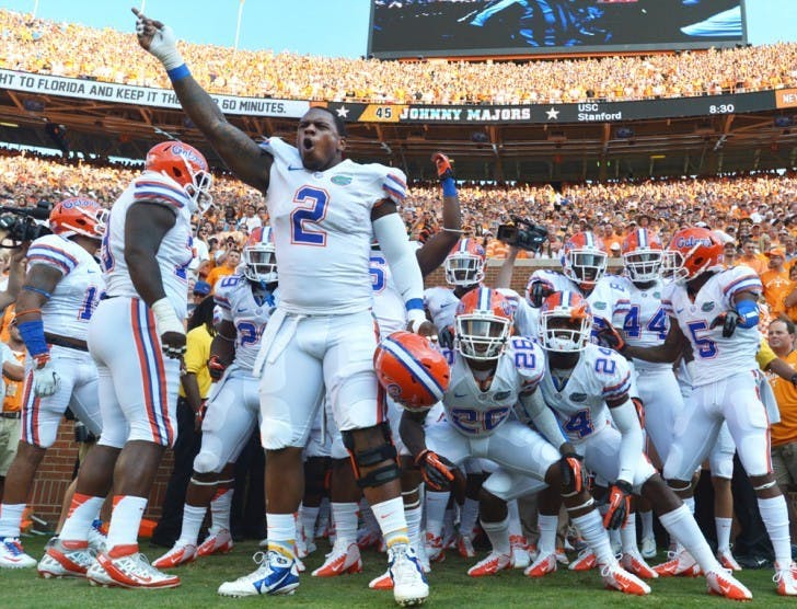 Junior defensive lineman Dominique Easley (2) hypes the team up before running on to the field at Neyland Stadium on Saturday.