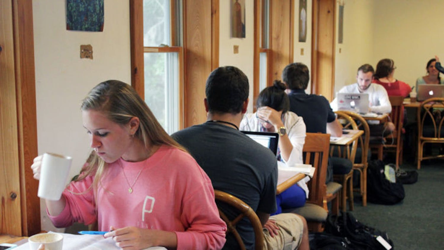 Students drink coffee and study at Pascal’s Coffeehouse, two blocks north of campus on Northwest 16th Street.