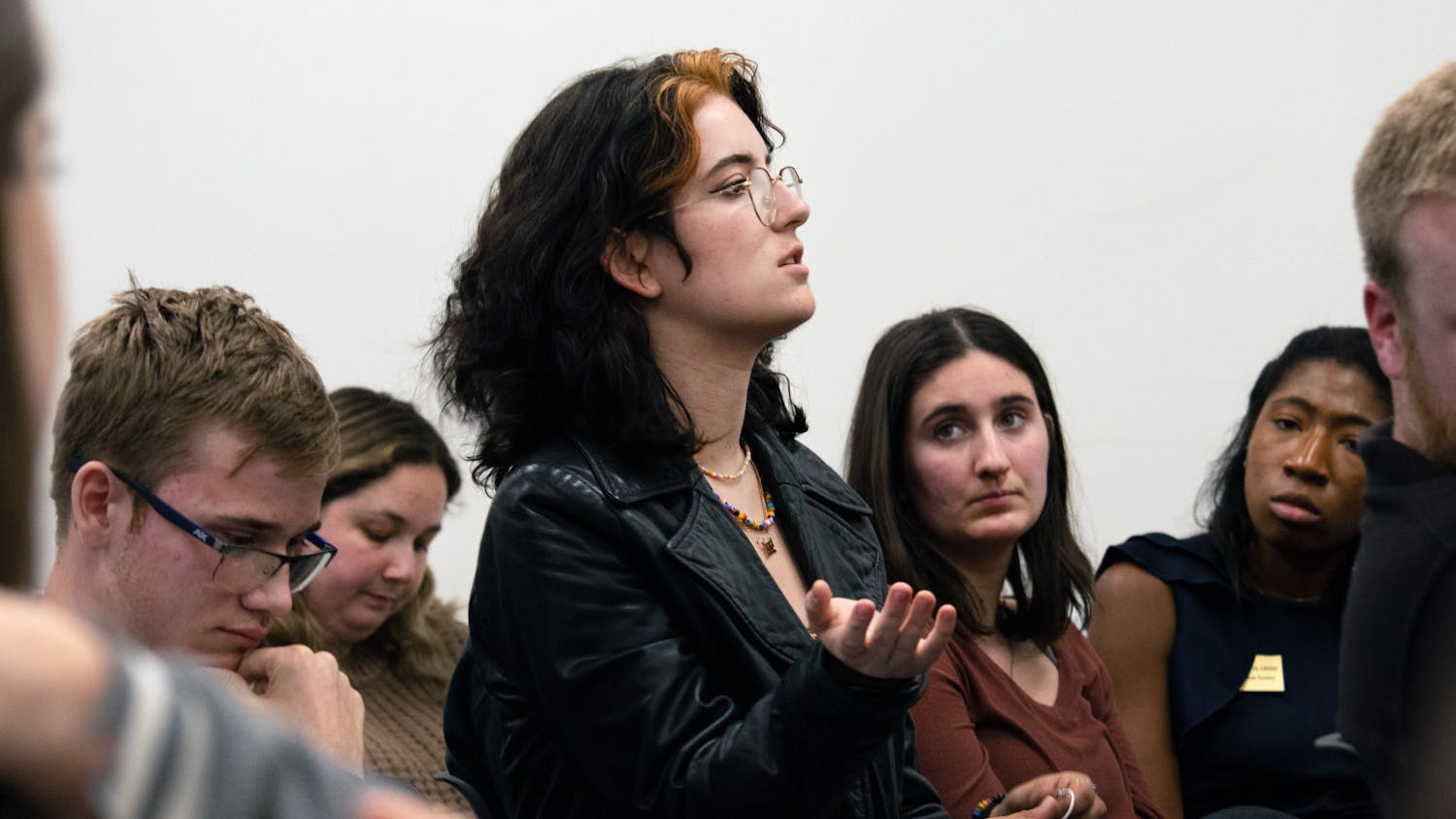 Fine Arts Senator of the Change Caucus Cassie Urbenz asks a question during the UF Student Senate Q&amp;A session about student organizational funding Wednesday, Jan. 11, 2023.