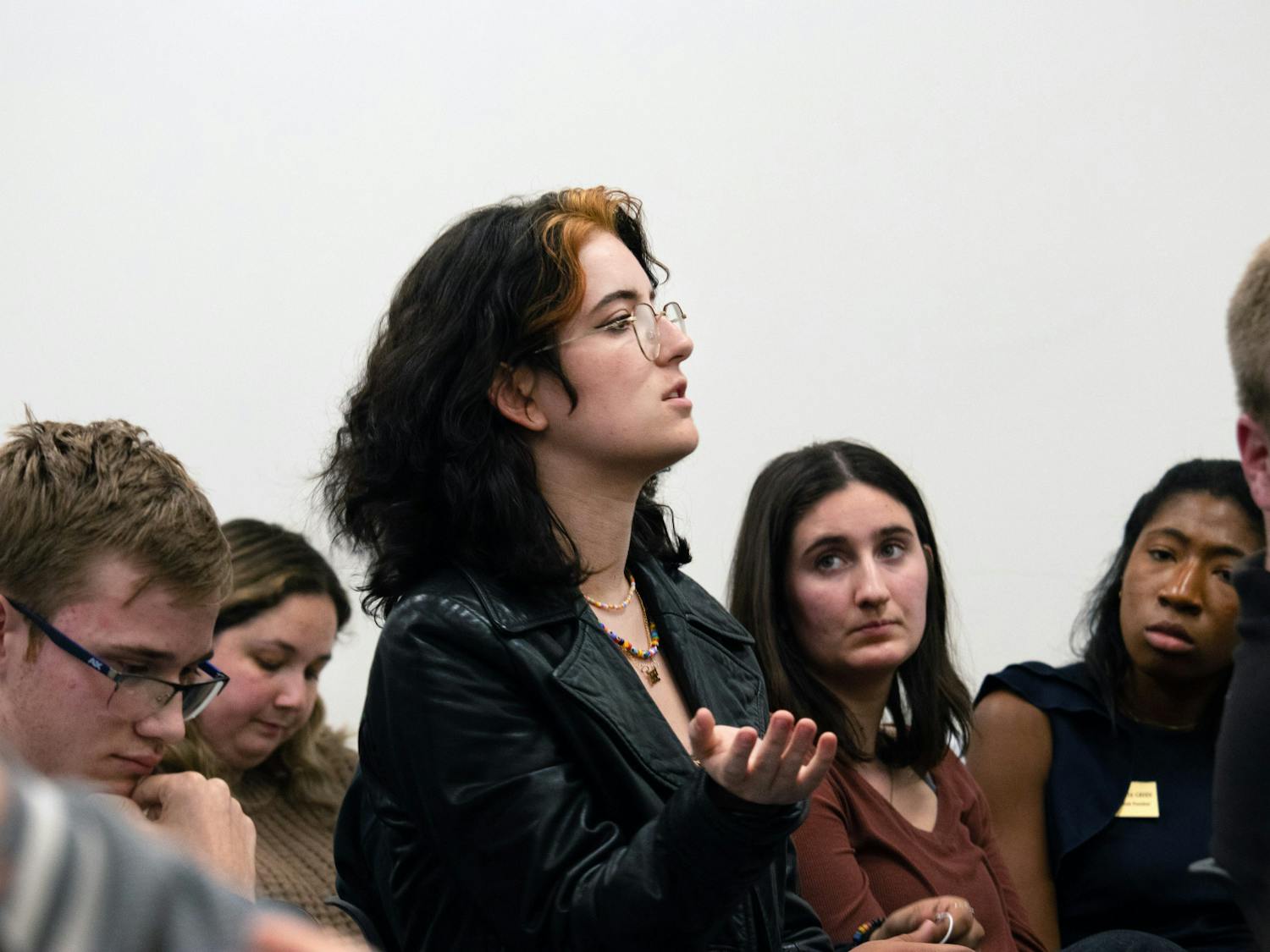 Fine Arts Senator of the Change Caucus Cassie Urbenz asks a question during the UF Student Senate Q&amp;A session about student organizational funding Wednesday, Jan. 11, 2023.
