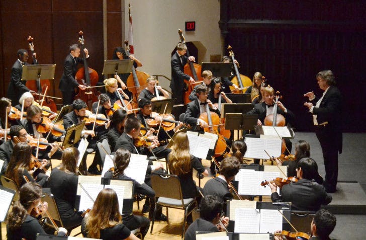 Raymond Chobaz conducts the UF Symphony Orchestra during a movement on Thursday in the University Auditorium. The performance featured works of Franz Beck, Ludwig van Beethoven and Johannes Brahms.