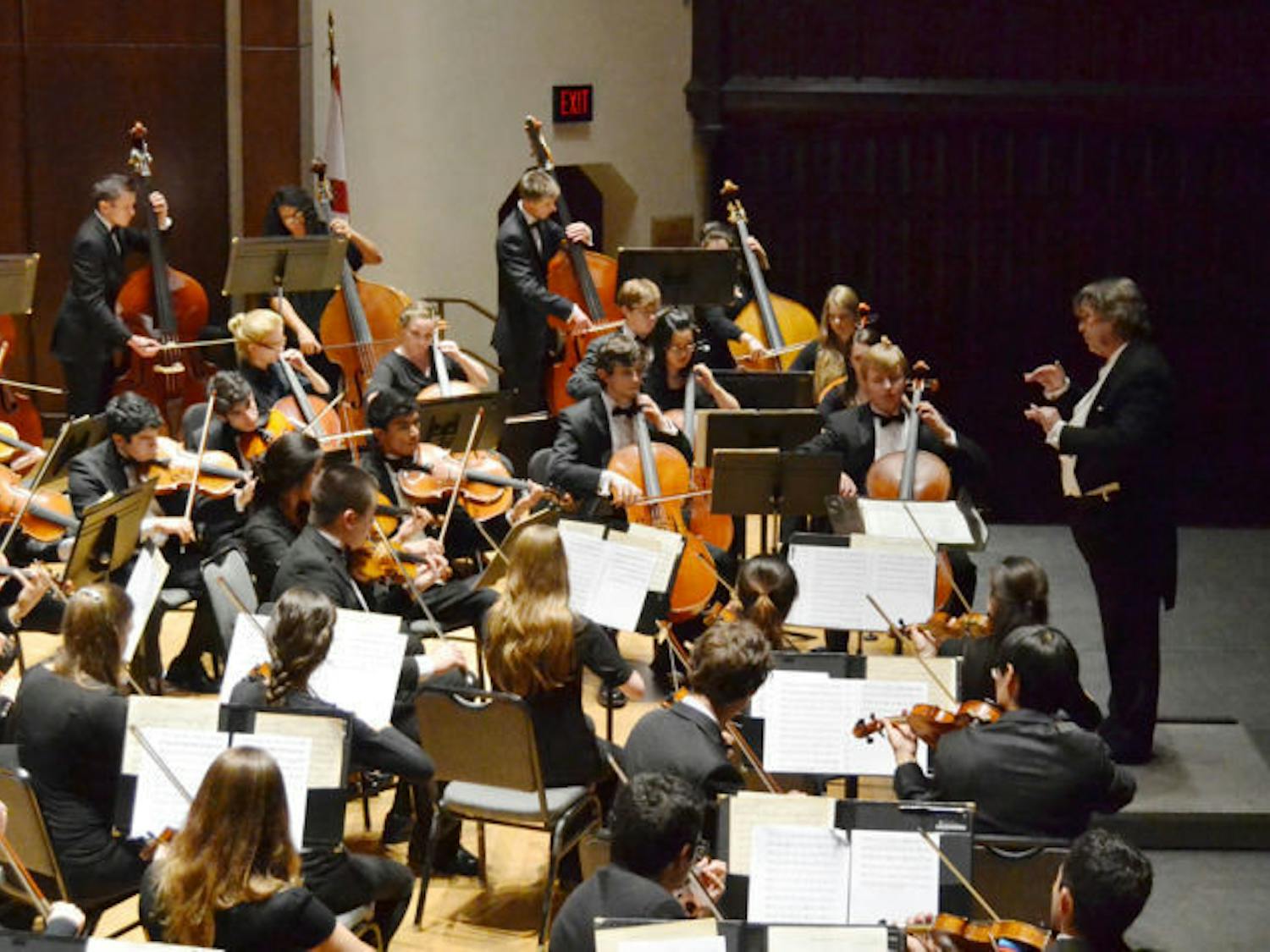 Raymond Chobaz conducts the UF Symphony Orchestra during a movement on Thursday in the University Auditorium. The performance featured works of Franz Beck, Ludwig van Beethoven and Johannes Brahms.