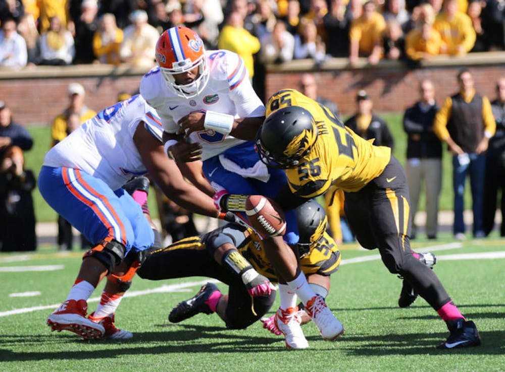 <p>Tyler Murphy fumbles the ball during Florida’s 36-17 loss against Missouri on Oct. 19 at Faurot Field in Columbia, Mo.&nbsp;</p>