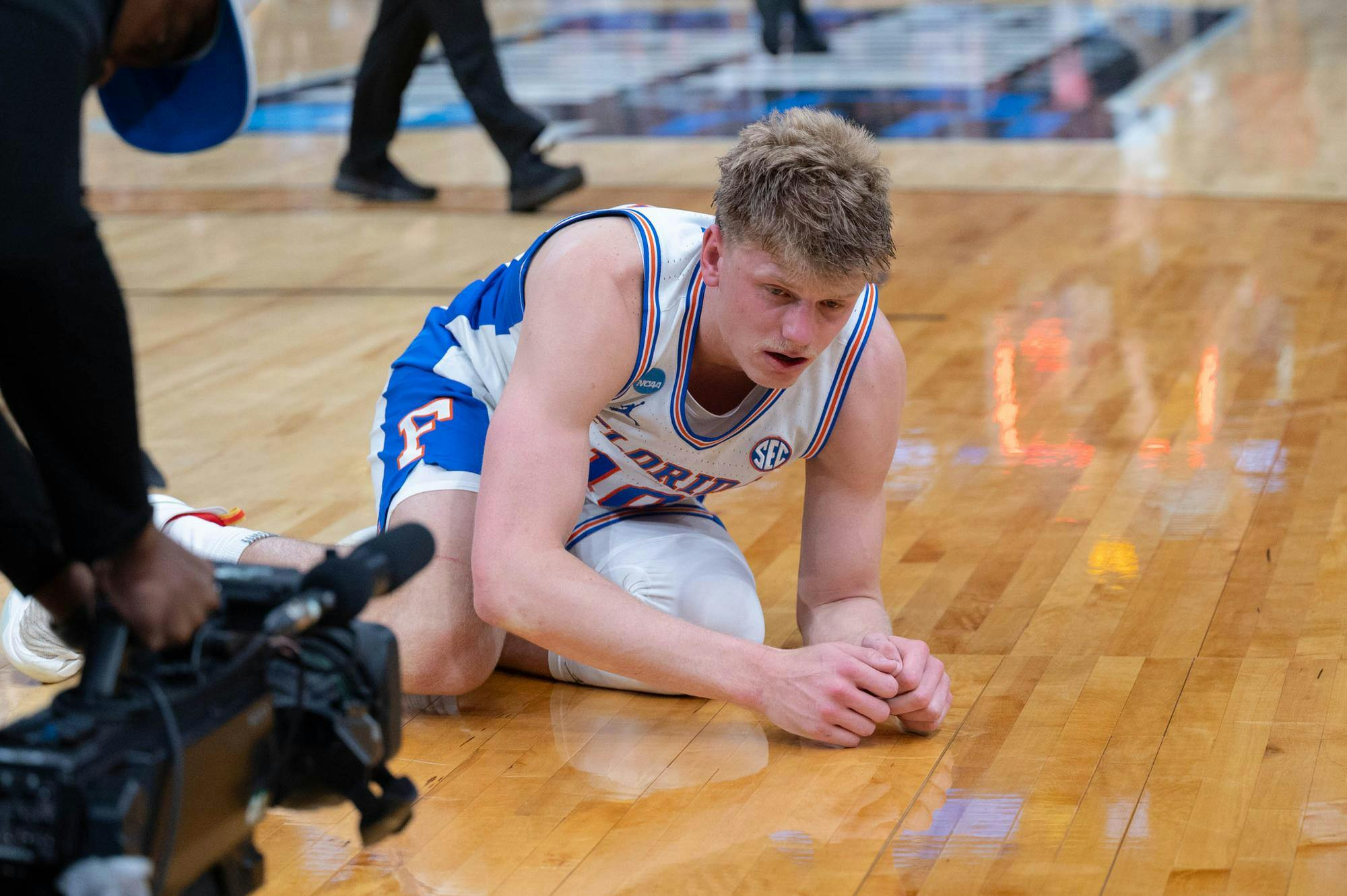 Florida forward Thomas Haugh (10) falls to the ground after losing to Iowa in an NCAA Tournament second round game against Iowa, Saturday, March 22, 2026, in Tampa, Fla.