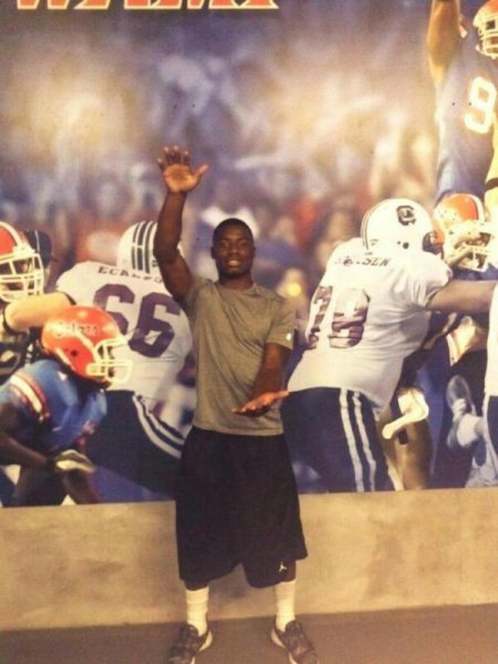 <p>Chauncey Gardner does the Gator Chomp in Ben Hill Griffin Stadium in a photo from his Twitter account (StillDat_) on June 15.</p>