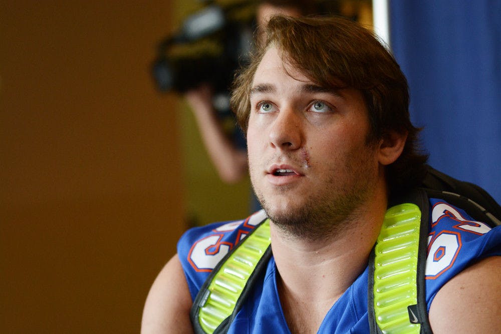 <p>Offensive lineman Trip Thurman speaks to media members during UF's Media Day on Aug. 5, 2015, at the Touchdown Terrace in Ben Hill Griffin Stadium.</p>