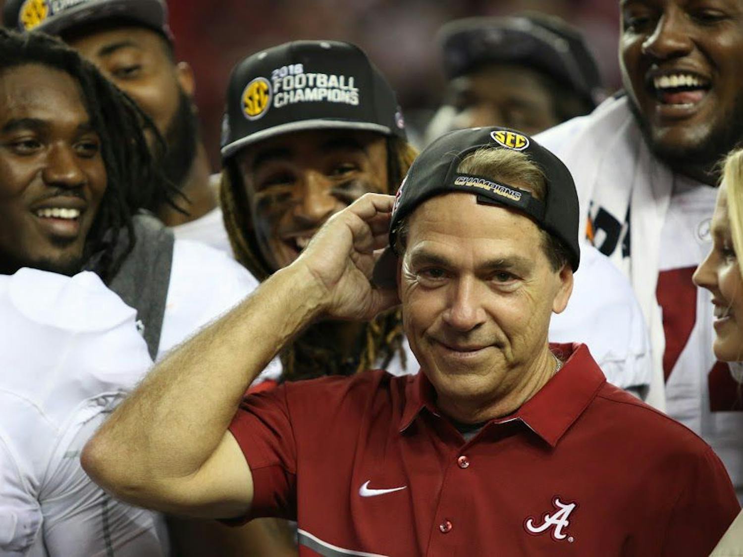 Nick Saban celebrates after winning the SEC Championship on Saturday, Dec. 3, in the Georgia Dome. 