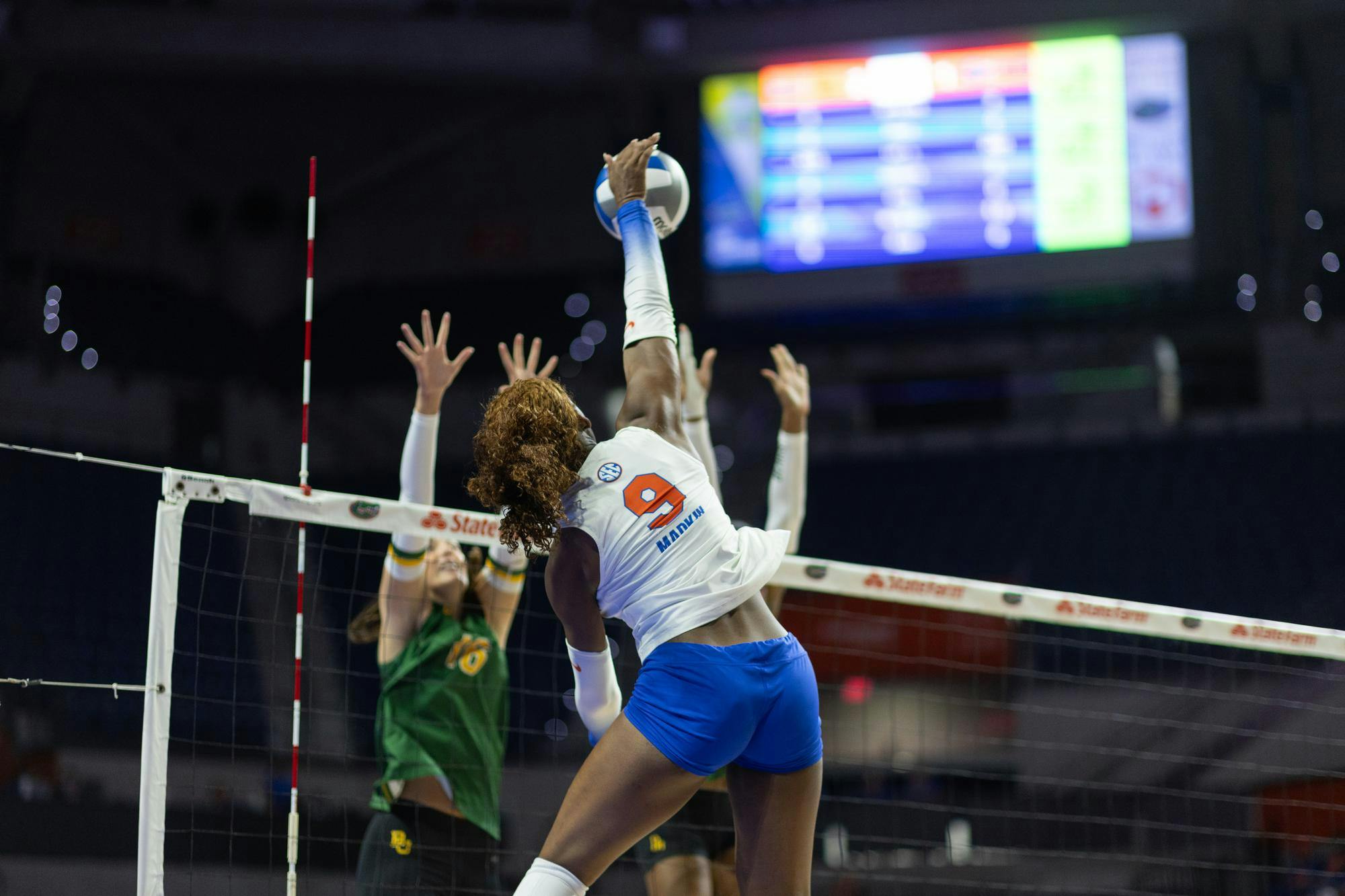 Florida Gators outside hitter Aniya Madkin (9) hits the ball during a volleyball match against the Baylor Bears at Exactech Arena at the Stephen C. O'Connell Center on Sunday, September 14, 2024.