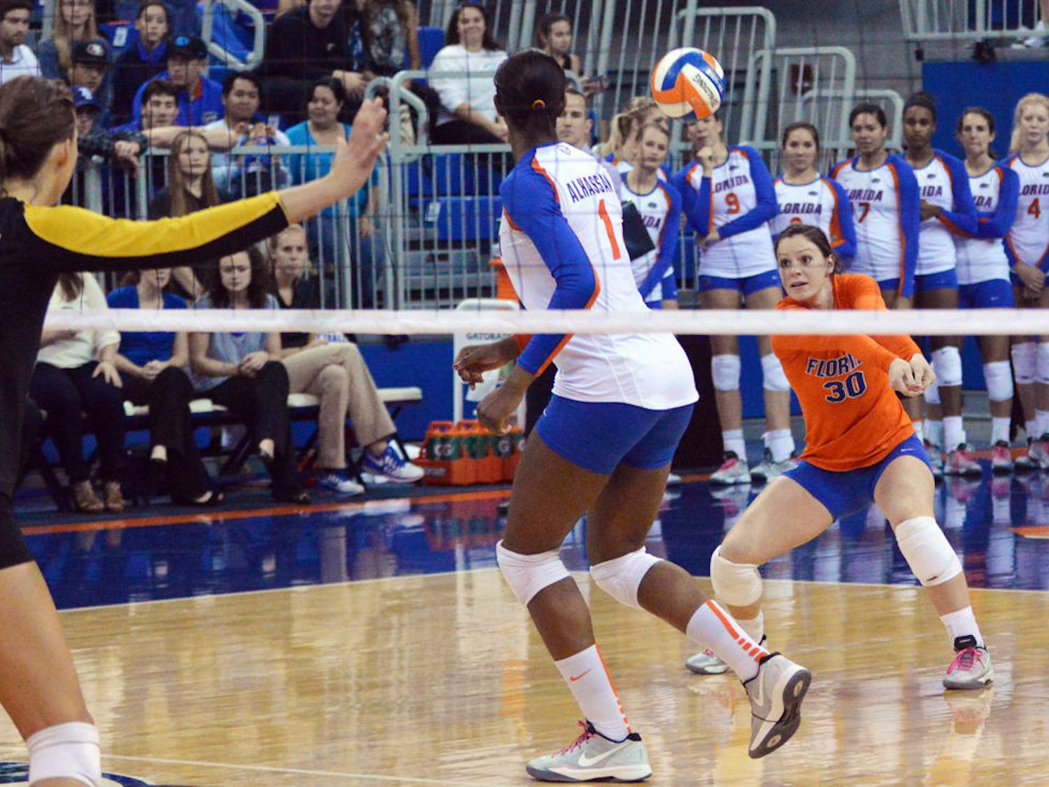 Libero Holly Pole (30) prepares to dig a ball during Florida's 3-0 win against Missouri in the O'Connell Center.