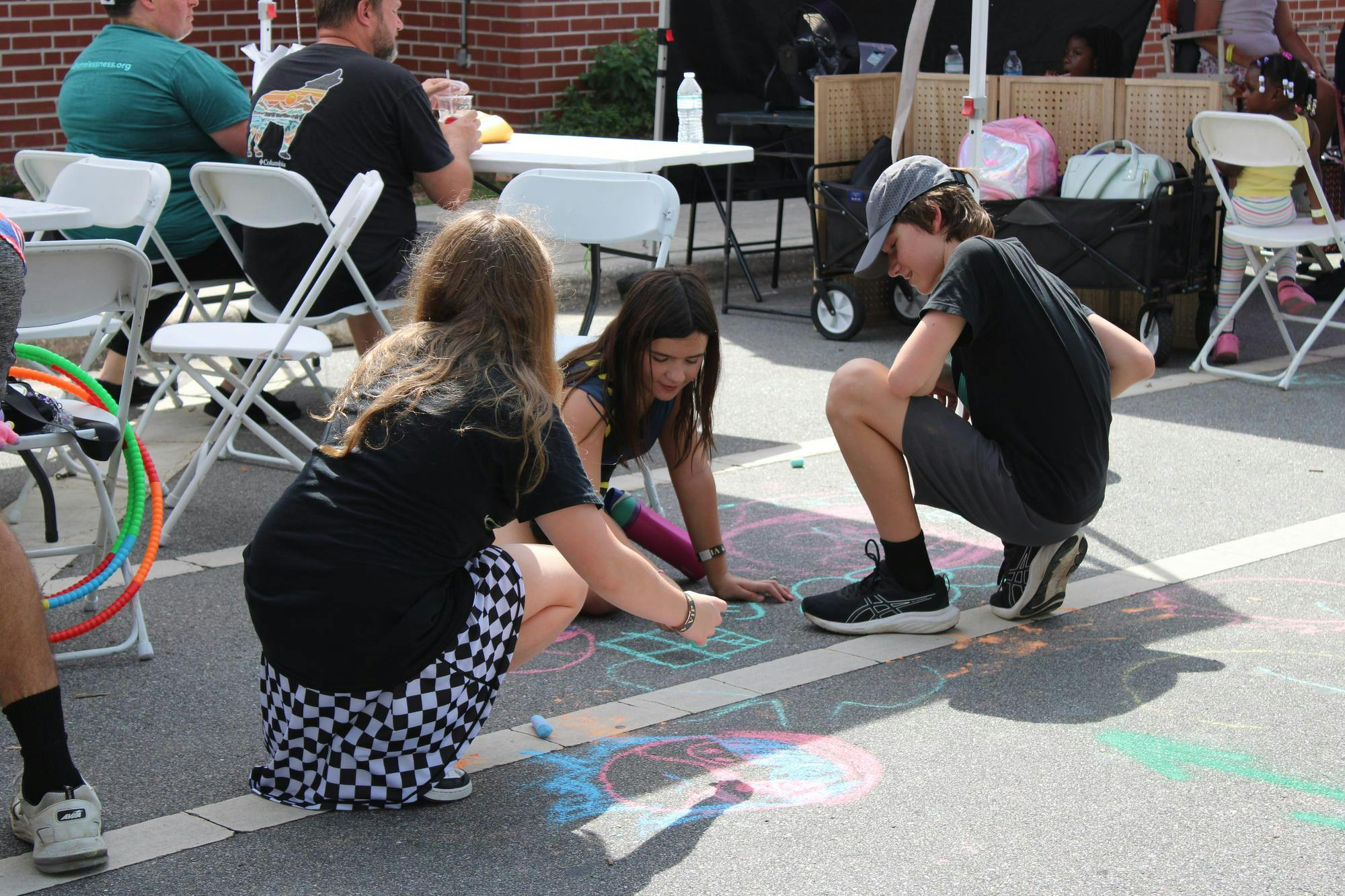 Attendees at Community Spring’s First Annual Block Party, Saturday, Oct. 3, 2026, in Gainesville, Fla.