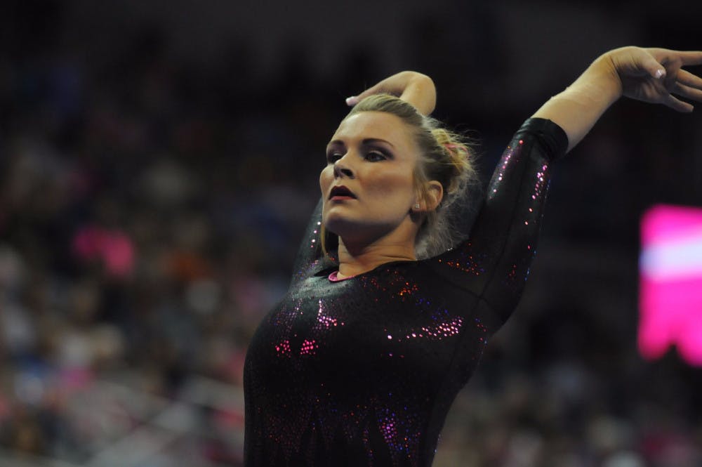 Bridget Sloan performs on the balance beam during Florida's win against Arkansas on Feb. 12, 2016, in the O'Connell Center.