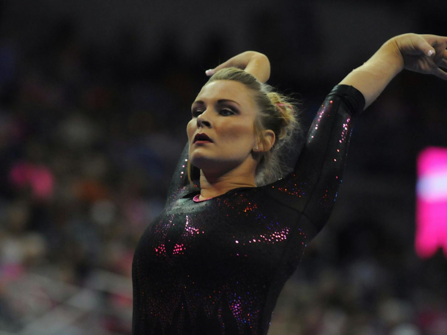 Bridget Sloan performs on the balance beam during Florida's win against Arkansas on Feb. 12, 2016, in the O'Connell Center.