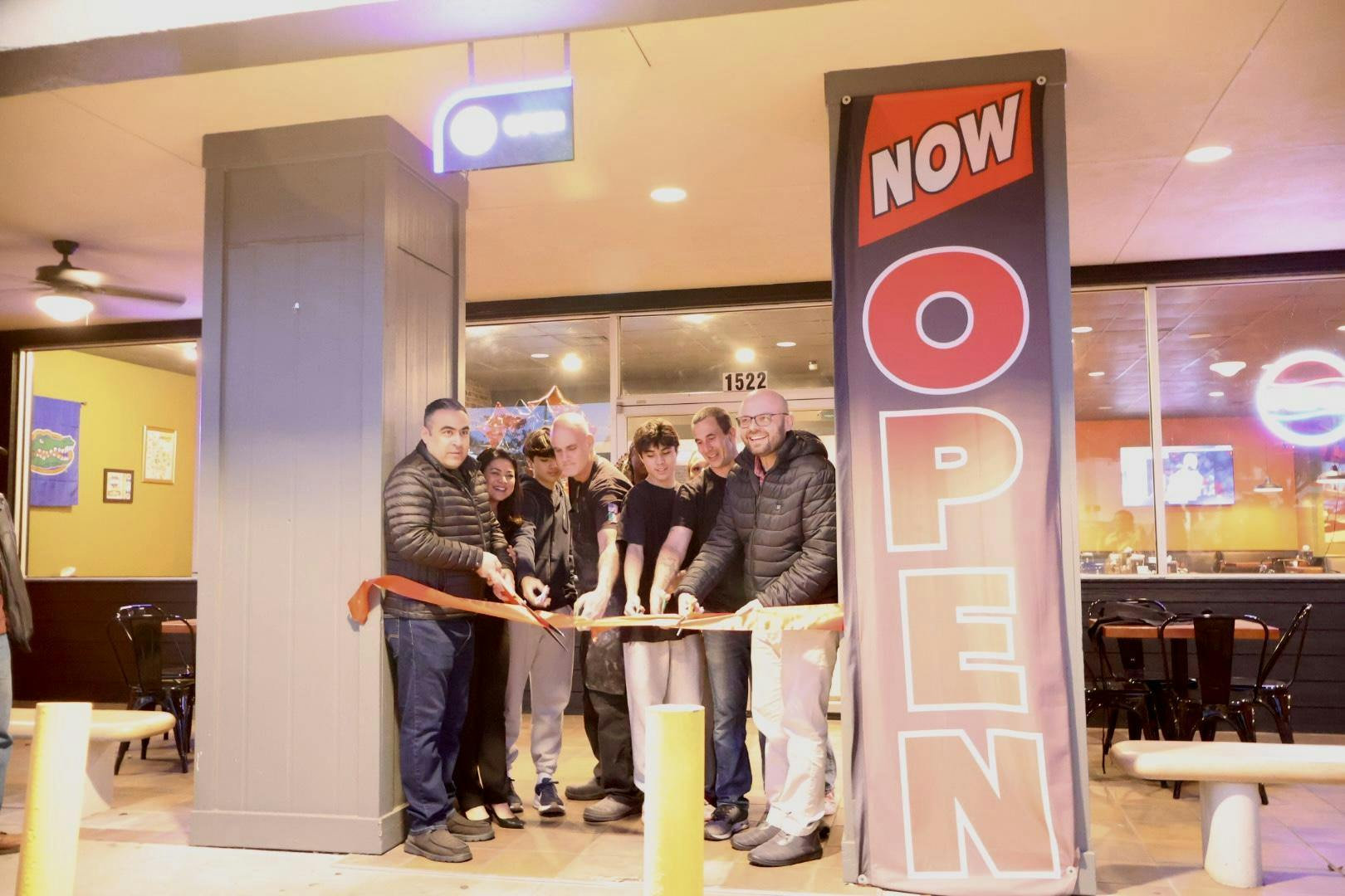 Bowie’s Pizza holds a grand opening celebration in Gainesville, Fla., Wednesday, Jan. 28, 2026. 