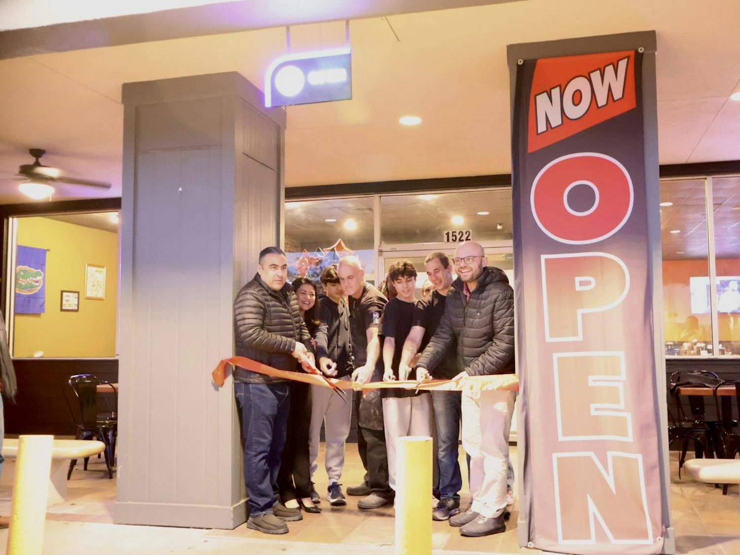 Bowie’s Pizza holds a grand opening celebration in Gainesville, Fla., Wednesday, Jan. 28, 2026.