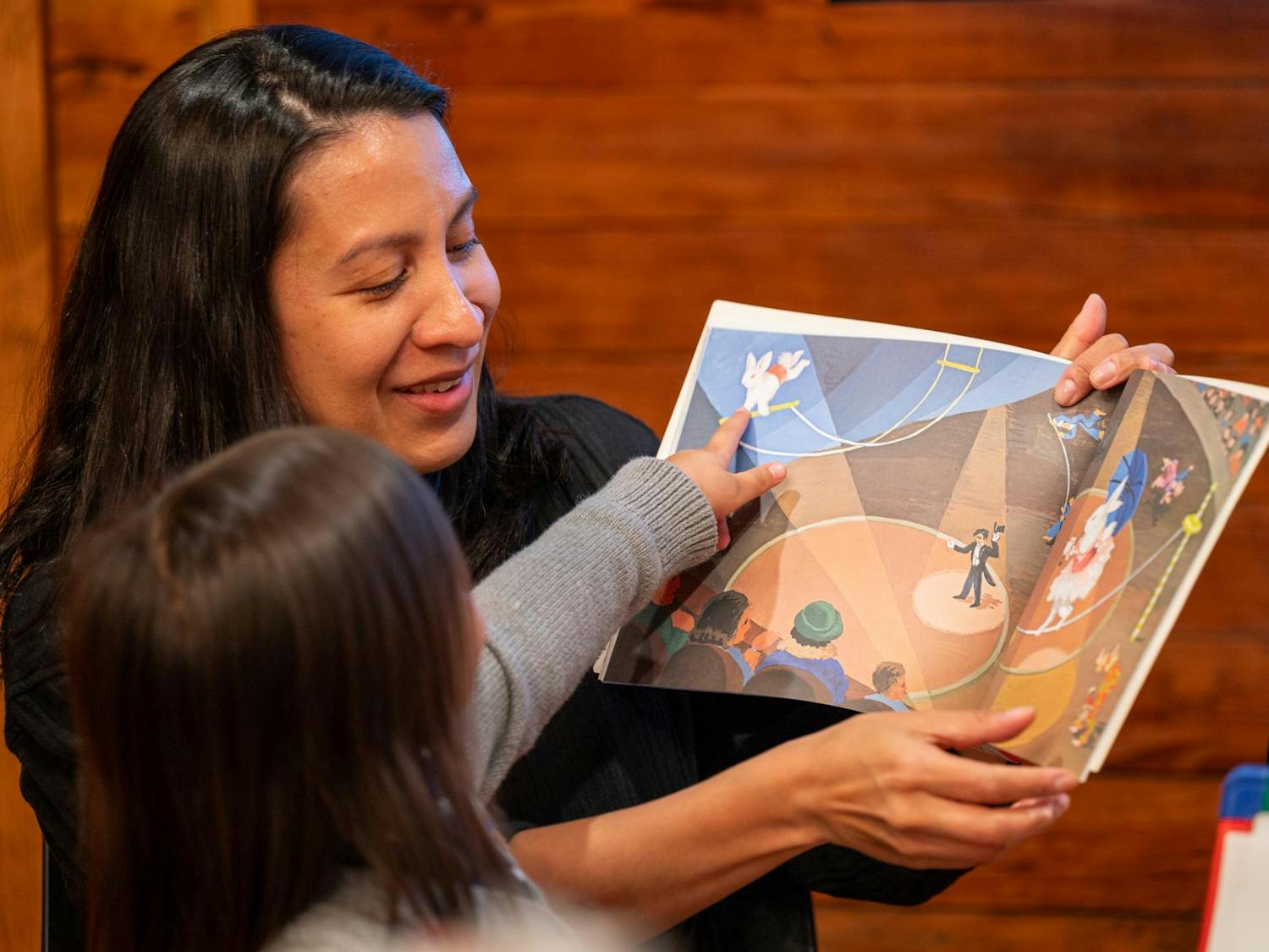 Anita Aguirre reads to children in Spanish at Hogtown Nature Preserve, Thursday, Feb. 12, 2026, in Gainesville, Fla.