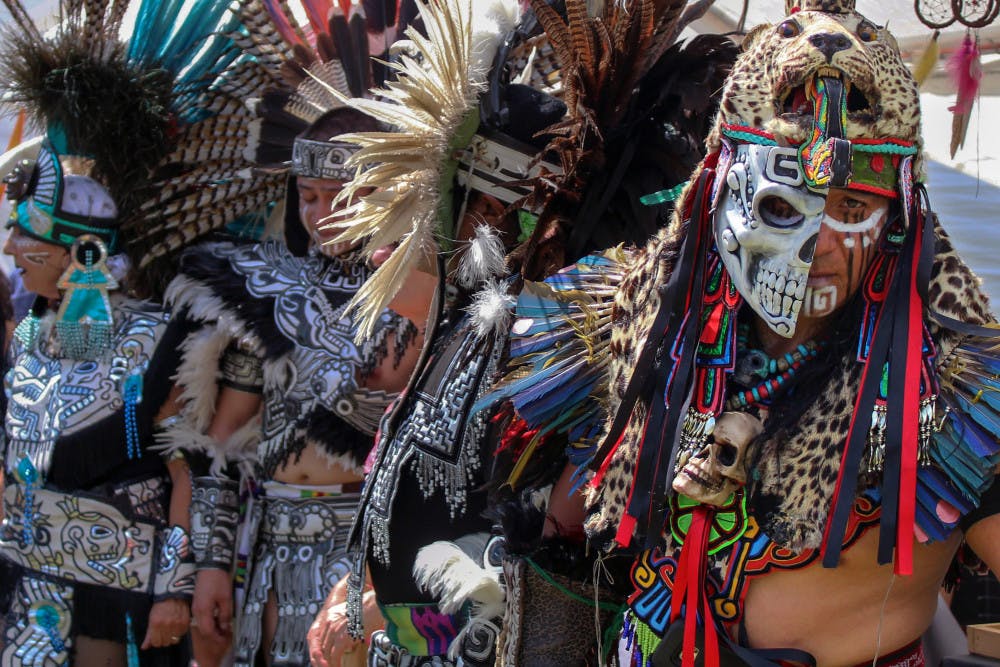 Jose Hernandez, a performer from Iztacalco, Mexico, stares down the camera Saturday after performing a traditional Mashika dance during the inaugural Gainesville Native American Festival at the Alachua County Fairgrounds, 3100 NE 39th Ave. The event celebrated Native American culture with a variety of performances and vendors, and hundreds of people attended the event.