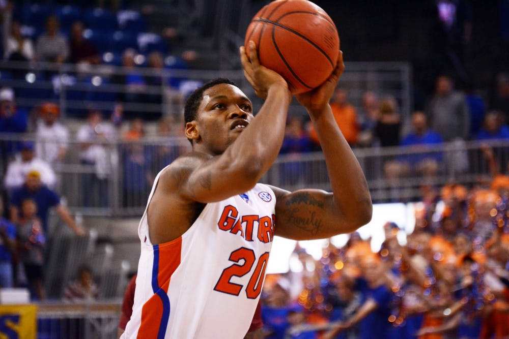 <p>Michael Frazier II attempts the game-winning free throw to give Florida a 57-56 win against Arkansas on Saturday in the O'Connell Center.</p>