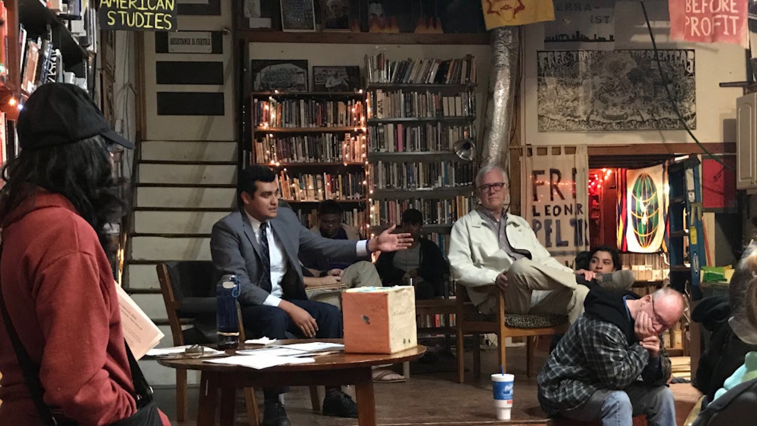 Gainesville City Commissioner David Arreola speaking about public transportation and energy conservation during the Clean Energy Campaign kickoff event Monday night. Made Spector / Contributing Writer