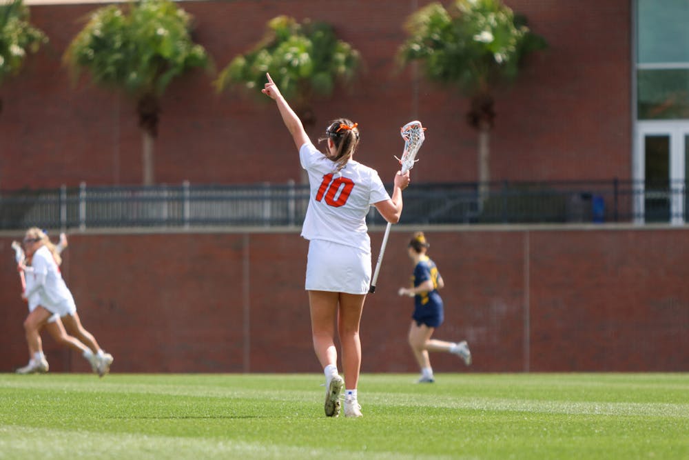 Florida attacker Danielle Pavinelli holds up the field during the Gators' 17-8 win over the Michigan Wolverines Sunday, Feb. 12, 2023.