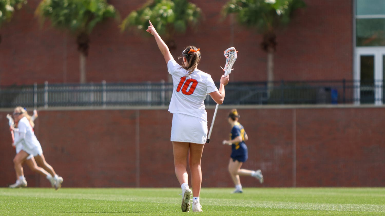 Florida attacker Danielle Pavinelli holds up the field during the Gators' 17-8 win over the Michigan Wolverines Sunday, Feb. 12, 2023.