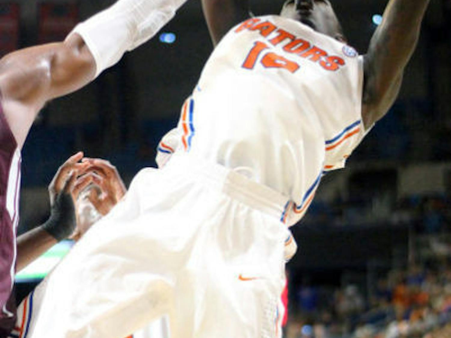 Dorian Finney-Smith attempts a shot during Florida’s 86-56 victory against Arkansas-Little Rock on Saturday in the O’Connell Center.