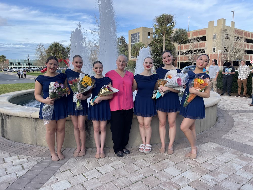 The dancers of the Sun Country Dance Theatre pose with artistic director Judy Benton on Sunday, Feb. 23, 2025. 