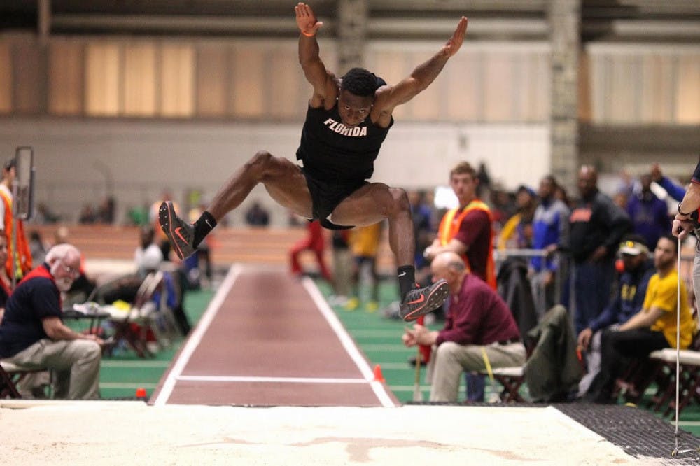 UF freshman Grant Holloway jumps at the Hokie Invitational men's long jump final on Jan. 21, 2017.
