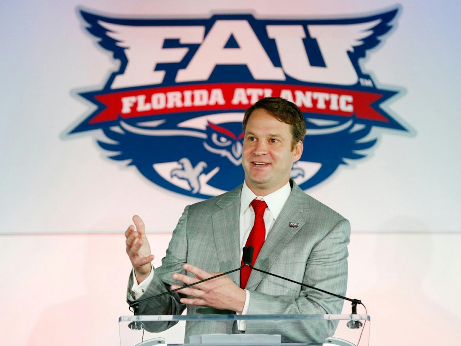Lane Kiffin speaks at his introductory press conference at FAU's football coach on Dec. 13, 2016, in Boca Raton, Florida.