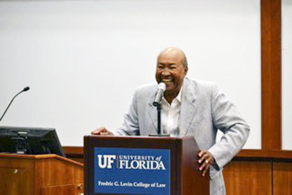 W. George Allen, the first African-American graduate of the UF College of Law, speaks to the Black Law Students Association and the Josiah T. Walls Bar Association on Friday.