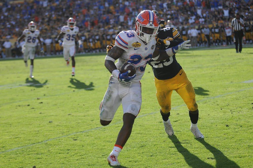 <p>UF freshman defensive back Chauncey Gardner returns one of his two interceptions during Florida's 30-3 win over Iowa in the Outback Bowl on Monday, Jan. 2, at Raymond James Stadium.&nbsp;</p>