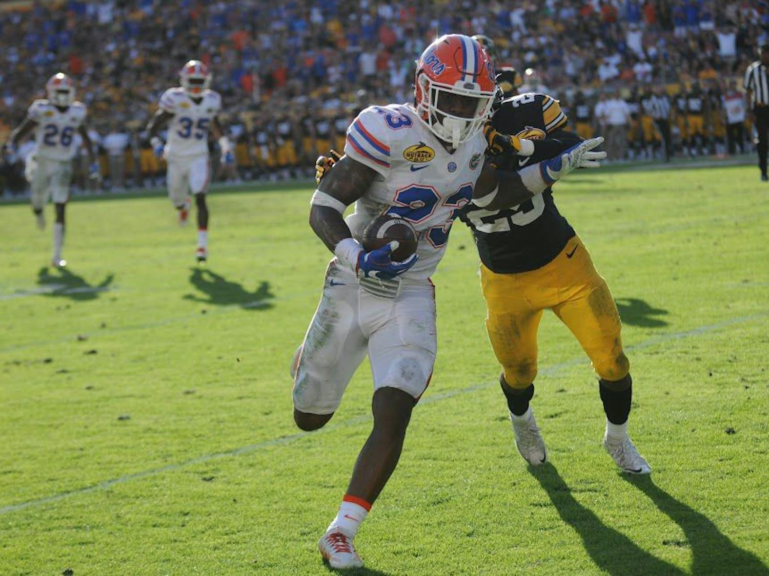 UF freshman defensive back Chauncey Gardner returns one of his two interceptions during Florida's 30-3 win over Iowa in the Outback Bowl on Monday, Jan. 2, at Raymond James Stadium.&nbsp;