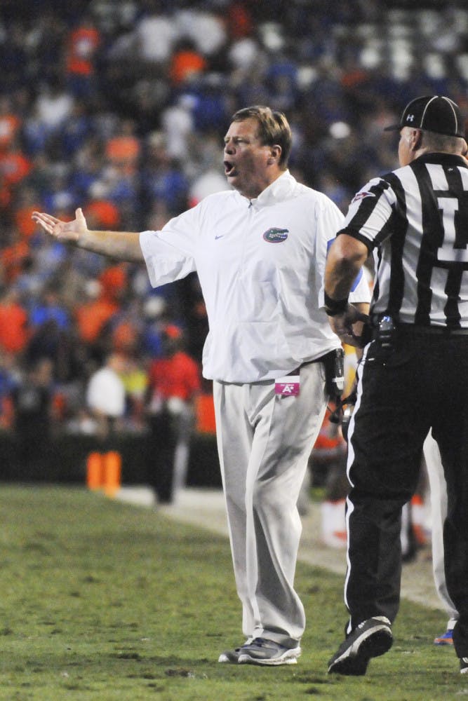 UF football coach Jim McElwain reacts after a penalty during Florida's 31-24 win against East Carolina on Sept. 12, 2015, at Ben Hill Griffin Stadium.