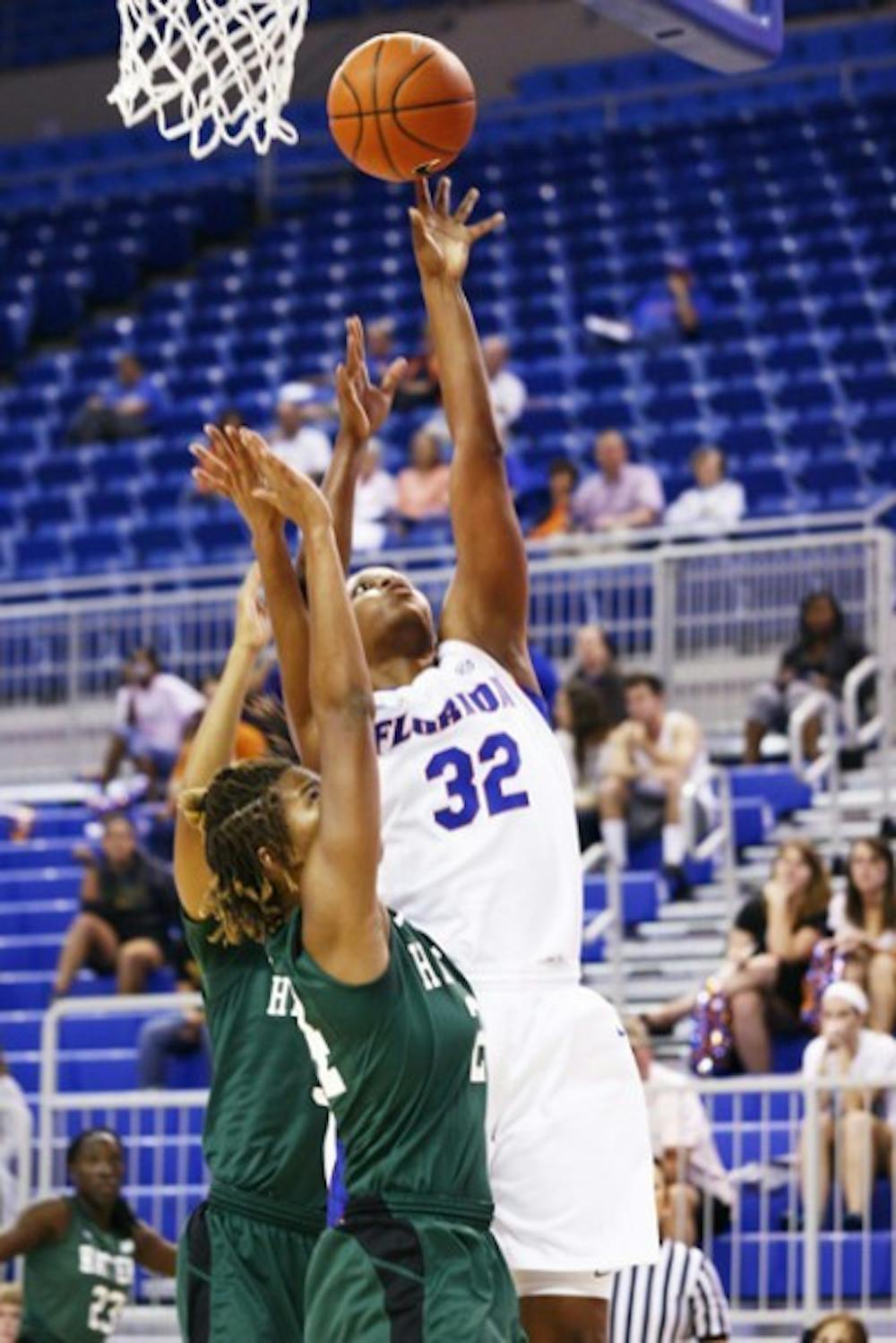 <p>Coach Amanda Butler said she wants to see forward Jennifer George (32) and the Gators box out well against Hampton tonight.</p>