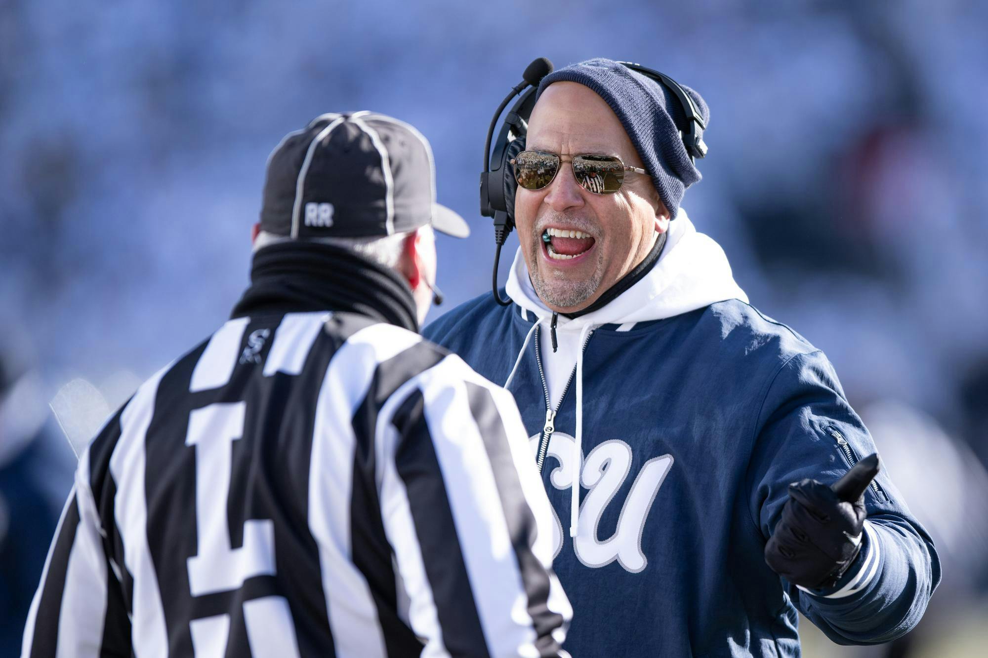Former Penn State head coach James Franklin talks to a referee during a NCAA college football playoff game against SMU on Saturday, Dec. 21, 2024, in State College, Pa.